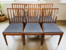 A set of six continental mahogany dining chairs.