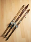 A group of vintage continental skis.