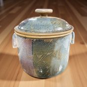 A decorative glazed earthenware crock pot, signed 'P' to underside, height 24 cm.