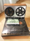 A Tandburg model 1600 reel to reel player and a Sony three-head stereo tapecorder.