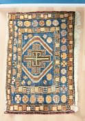 An antique Caucasian rug,
