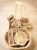 A group of wicker baskets, plant stand, etc.