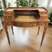 A reproduction mahogany lady's writing desk,