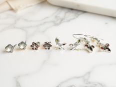 Four pairs of silver gem-set earrings including garnet,
