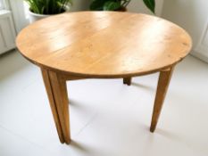 A pair of 19th century pine demilune tables, each 112 cm x 56 cm x 74 cm.