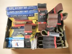 New packs of sanding belts, several twenty five piece socket sets, wire cutters, etc.