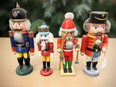 A Vintage German Democratic Republic Erzgebirge Wooden Nutcracker Doll, modelled as a soldier,