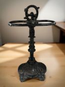 A Victorian painted cast iron umbrella stand, height 59 cm.
