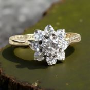 An 18ct gold diamond cluster ring, approximately 0.