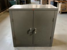 A Howden enameled metal double door cabinet with key, 90 cm x 47 cm x 90 cm.