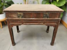 A 19th century Chinese lacquered elm two drawer side table,
