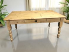 A 20th century pine farmhouse dining table in the Victorian style,
