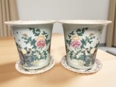 A large pair of 20th century Chinese celadon glaze famille rose porcelain planters on circular