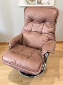 A Scandinavian chrome framed swivel lounge armchair in the manner of Pieff,