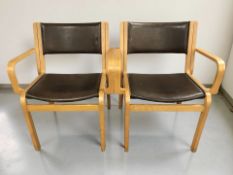 A pair of Danish Botium laminated bentwood armchairs, designed by Rud Thygesen and Johnny Sorensen.