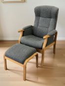 A Nordic bent laminated wood armchair in grey fabric, with matching footstool.