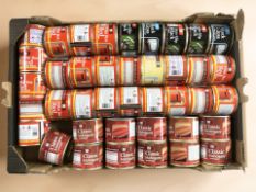 Assorted new tins of paint in various colours and finishes.