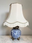 A 20th century Chinese blue and white porcelain bulbous jar, converted to a table lamp,