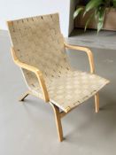 A contemporary Scandinavian bentwood and canvas lattice armchair in the manner of Finn Ostergaard,