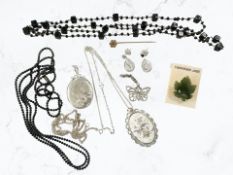 Costume items including a silver locket, Victorian stick pin,