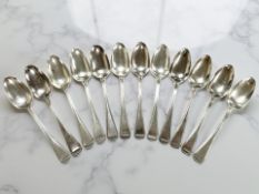 A set of ten George III silver table spoons, Solomon Hougham, London 1802.