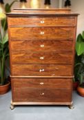 A 19th century continental walnut seven drawer chest, 102 cm x 55 cm x 160 cm.
