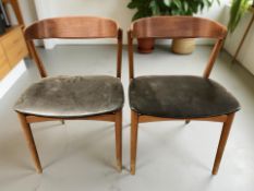 A pair of Danish Oddense Maskinsnedkeri teak dining chairs designed by Erik Buch