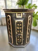 A 19th century continental painted pine corner wall cabinet, painted with initials and dated 1814,