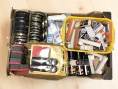 New tins and bottles of shoe polish, shoe polishing brushes and pads.