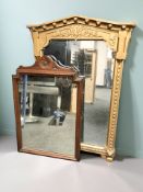 A 19th century gilt gesso wall mirror, height 101 cm, and a further walnut mirror.