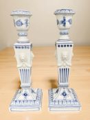 A pair of Royal Copenhagen blue and white porcelain neoclassical candlesticks, height 22.5 cm.