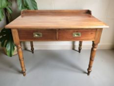 A late Victorian mahogany writing table,