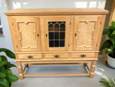 A Danish stained and blond oak sideboard,