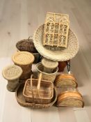 A collection of wicker baskets, a chair, stools, etc.