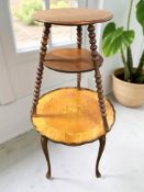 A mahogany bobbin turned two tier circular table and a further kingwood veneered continental