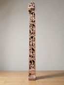 An oriental heavily carved wooden column,