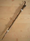 Two Victorian bamboo walking sticks.