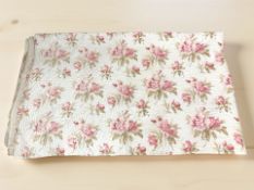 A vintage floral quilt, approximately 210 cm x 250 cm.