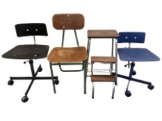 Four various industrial style chairs and stools.