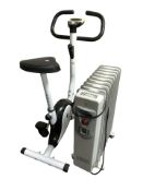 An exercise bike and an Alaska oil filled radiator