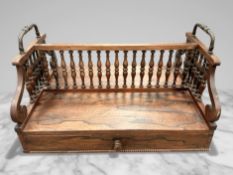 An early Victorian rosewood double-sided book stand,