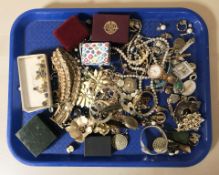 A collection of costume jewellery including various bangles, watches, pendants, brooches, etc.