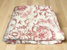 A French cotton quilt decorated with cherubs, approximately 250 cm x 250 cm.