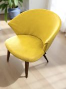 A 20th century Scandinavian lounge elbow chair in yellow upholstery, in the manner of Nanna Ditzel,