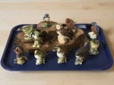 Eleven Beswick and John Beswick birds including kingfishers, goldcrest, goldfinch, whitethroat,