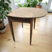 A 19th century mahogany drop leaf sofa table fitted a drawer,