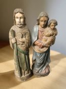 A pair of carved and painted wooden figures depicting Jesus, Mary and Joseph, tallest 95 cm.