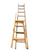 A pine ladder, length 270 cm, and a further wooden step ladder.