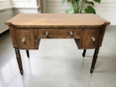 A late 19th century mahogany and satin wood inlaid bow-front three drawer side table in the Regency