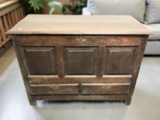 A 18th century panelled oak mule chest,